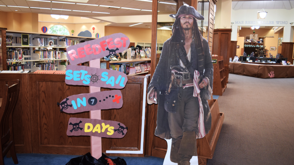 cutout of Jack Sparrow character next to a sign saying Reedfest is in 7 days