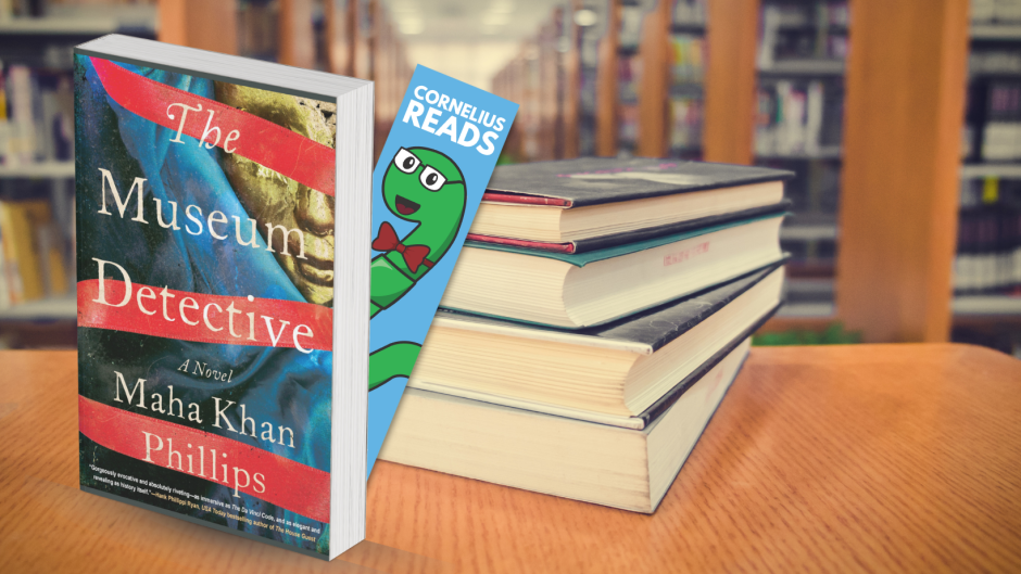 a book, The Museum Detective, standing upright on a table