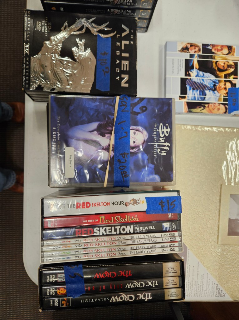 DVDs for sale on a table